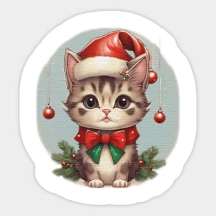 cute little kitten wearing a santa hat Sticker